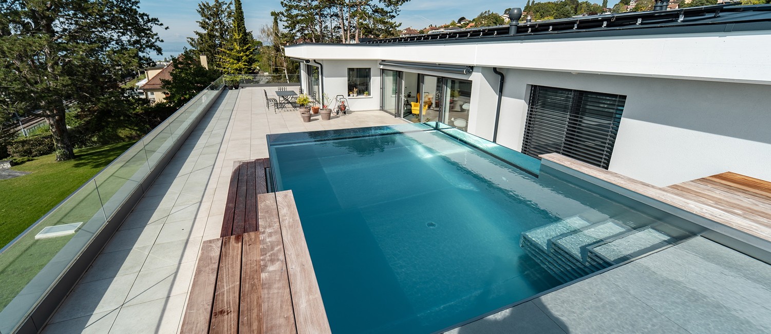 piscine inox et verre à débordement